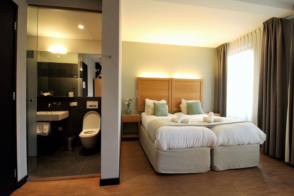 The Bank Hotel Amsterdam Bagian luar foto