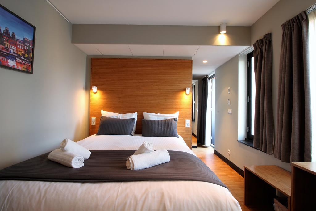 The Bank Hotel Amsterdam Bagian luar foto